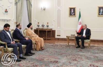 الرئيس الايراني والسيد الحكيم يؤكدان على تعميق العلاقات الاستراتيجية بين إيران والعراق